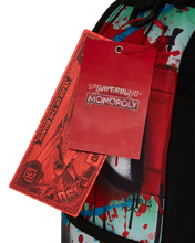 Load image into Gallery viewer, Sprayground - Monopoly Man Sprayed Board DLXR Backpack - Clique Apparel